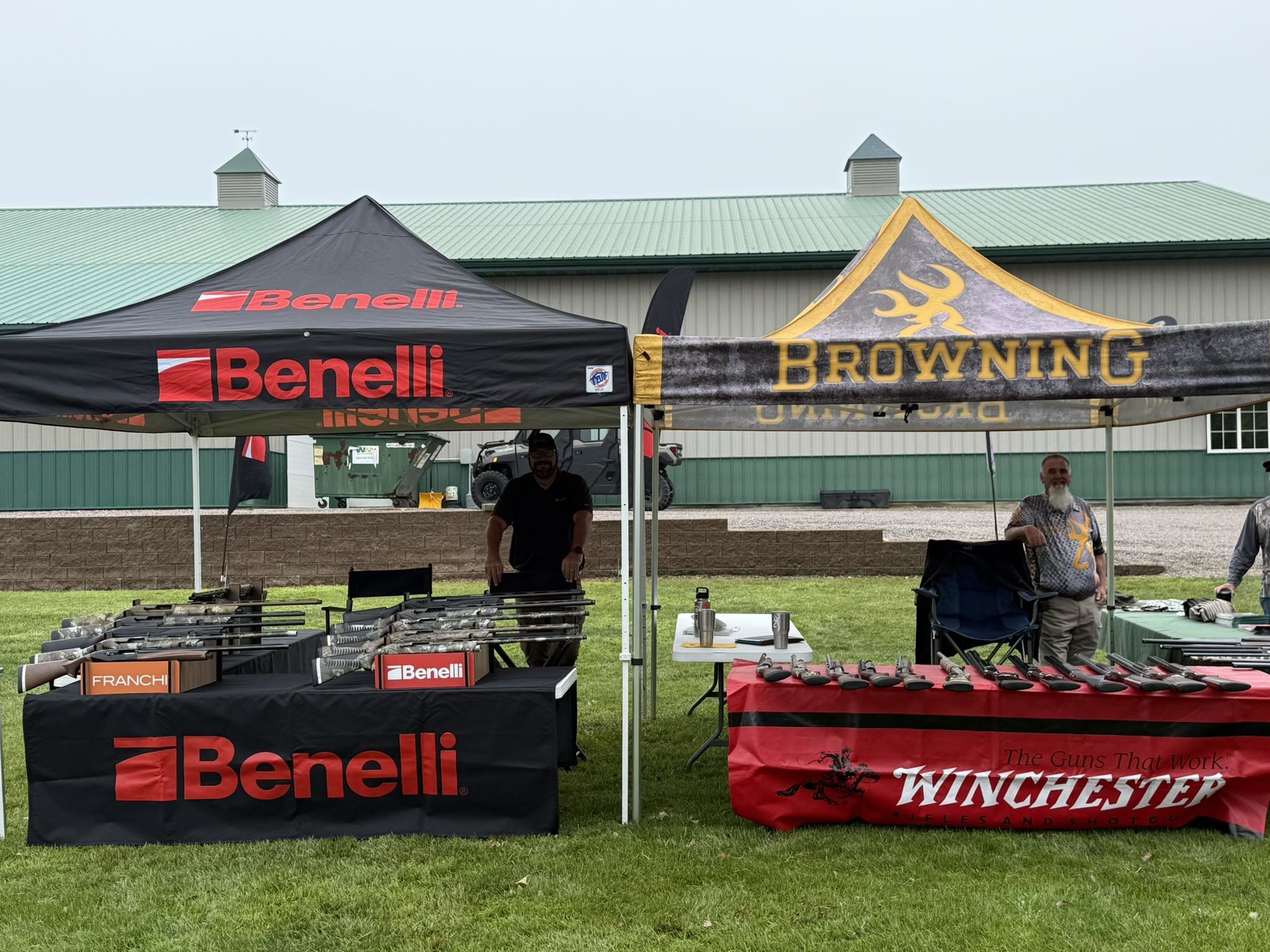 Browning and Benelli manufacturer displays set up at a Kjergaard Sports event
