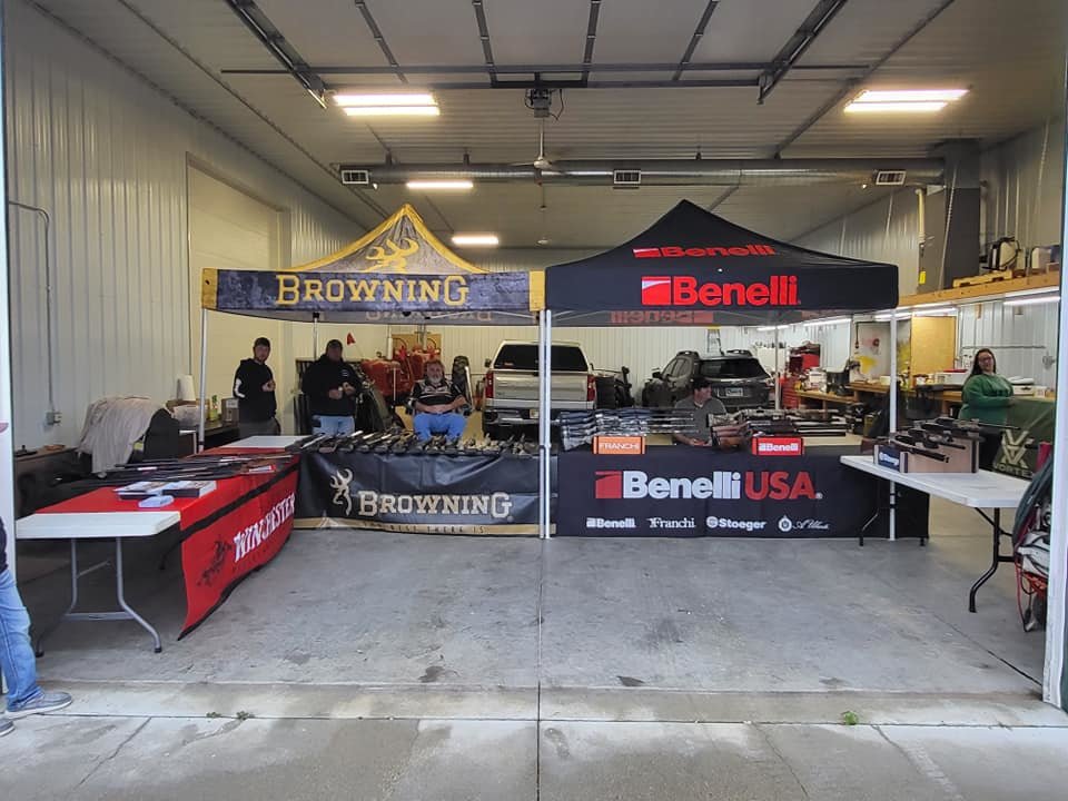 Beretta, Nosler, and BPI Outdoors manufacturer booths at a Kjergaard Sports event