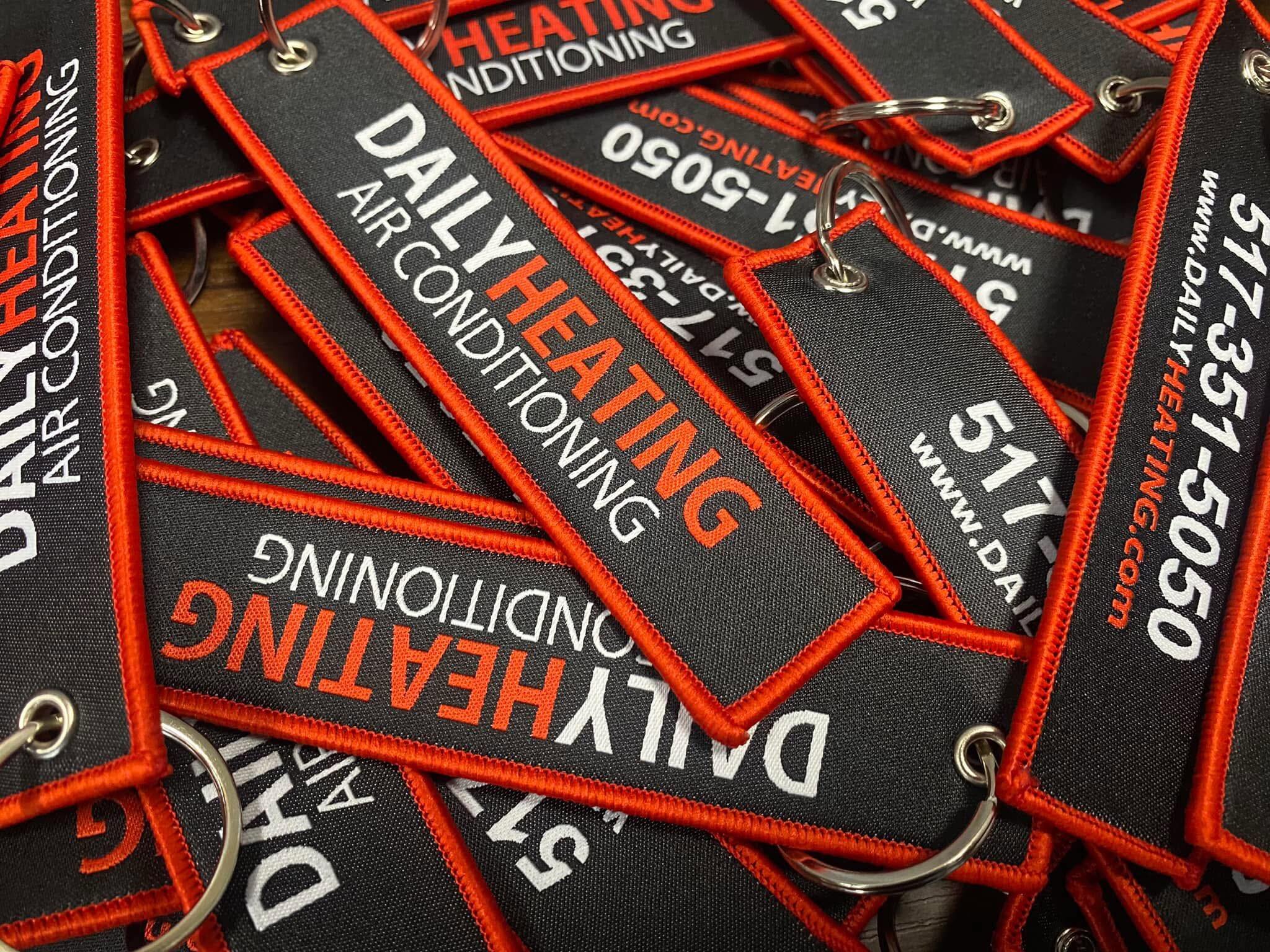 Daily Heating Air Conditioning custom key tags with website and phone