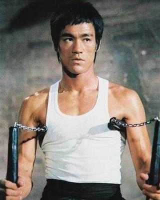 Brue Lee with traditional Nunchaku