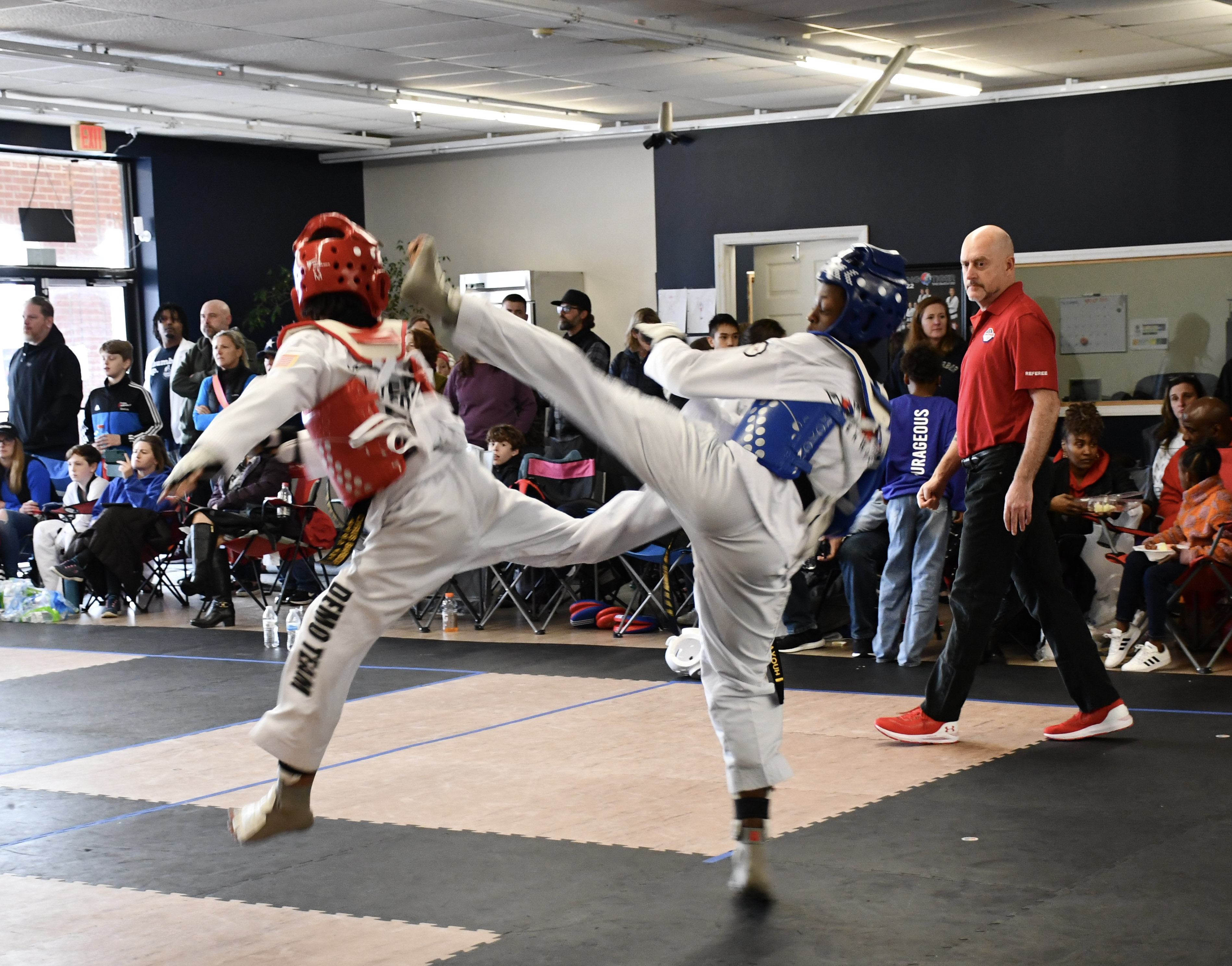 Cyrus Barbour competing in Taekwondo