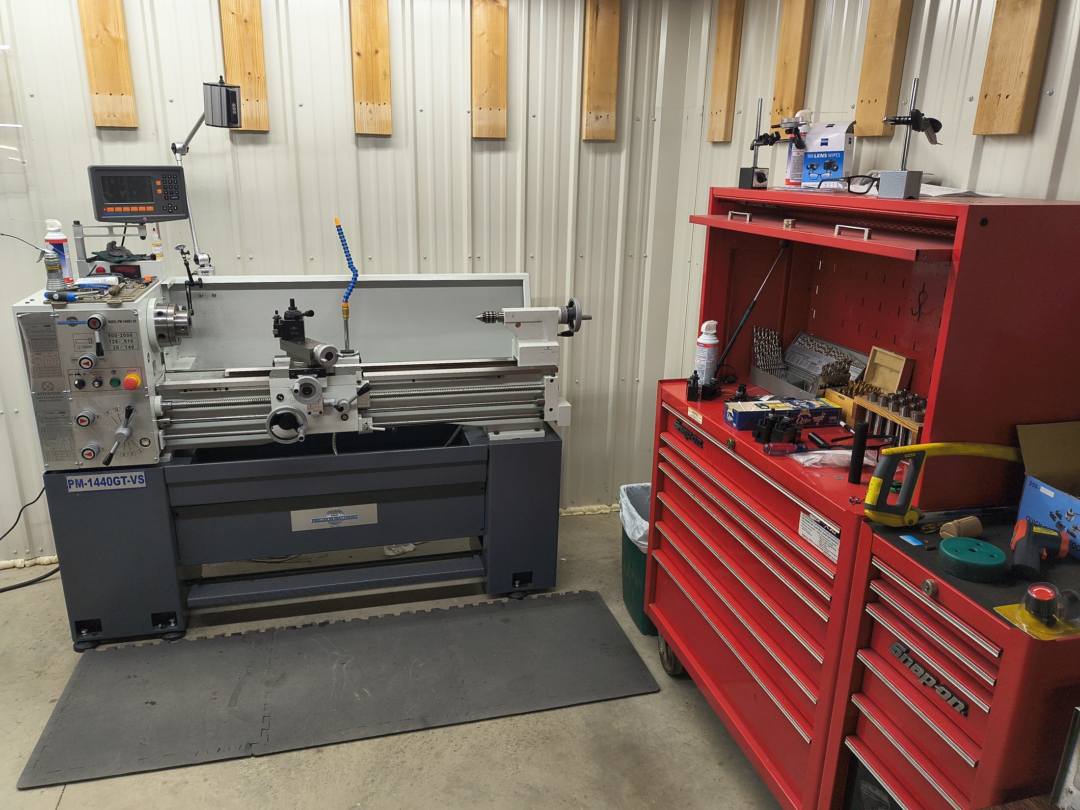 Gunsmithing workshop at Kjergaard Sports — lathe and shop tools
