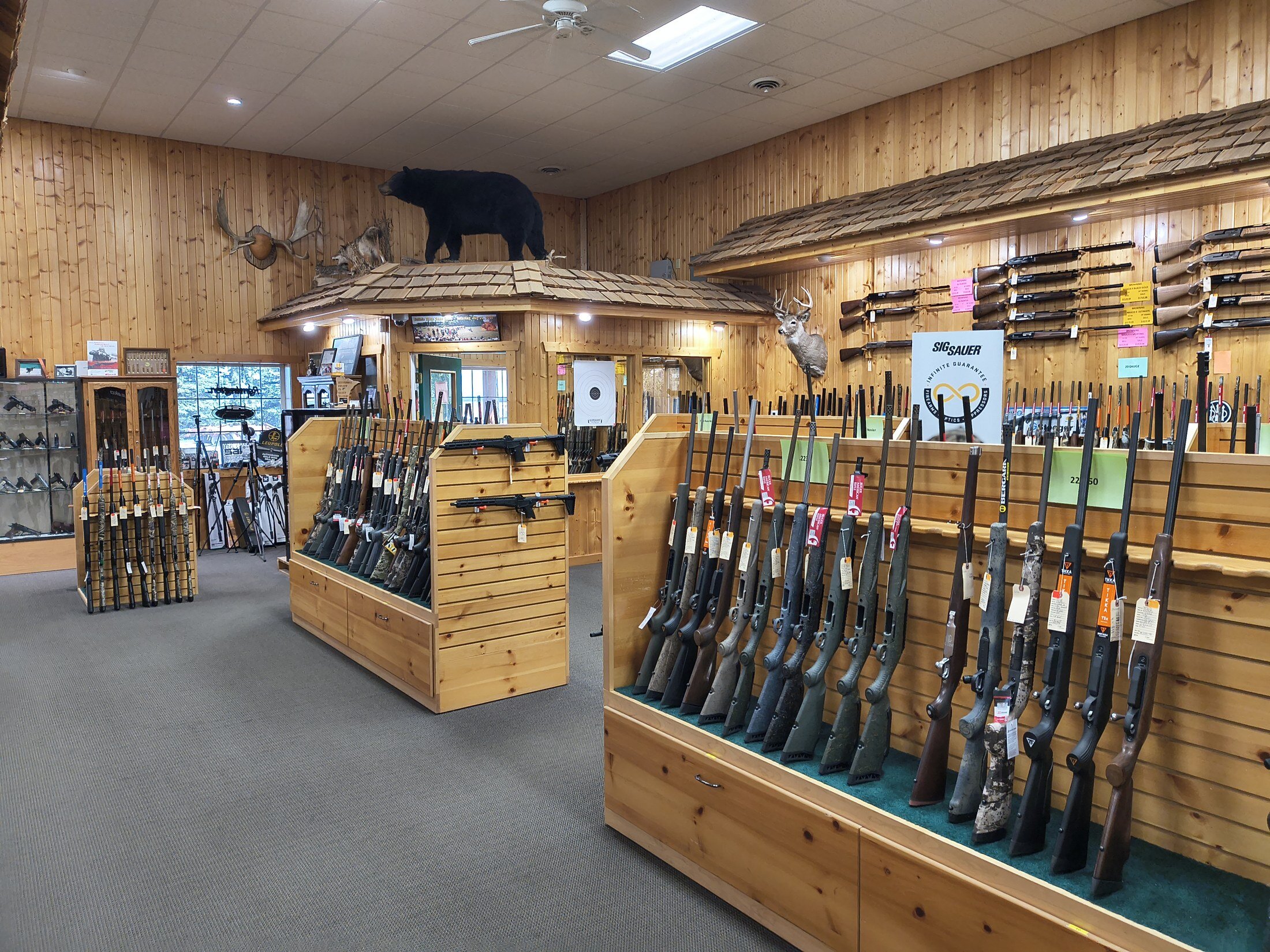 Kjergaard Sports store interior — banquet and fundraiser firearm partner