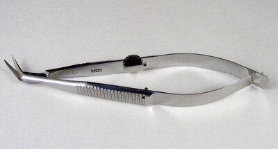 Troutman-Castroviejo Corneoscleral Scissors with stop, medium blades, flat serrated handle - right