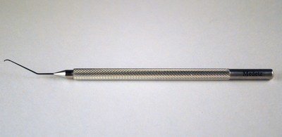 Nucleus Chopper Angled, Curved Interior Cutting Edge with .5mm Olive Shaped Tip, for use in the LEFT HAND, Slightly Angled 15mm from bend to tip, Round Knurled Handle, 117mm Overall