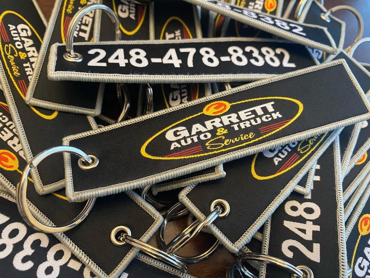 Custom embroidered Garrett Auto & Truck Service key tags made in Michigan
