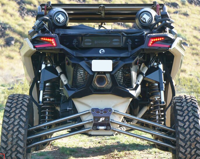 Bump stop assembly installed on a Can-Am X3